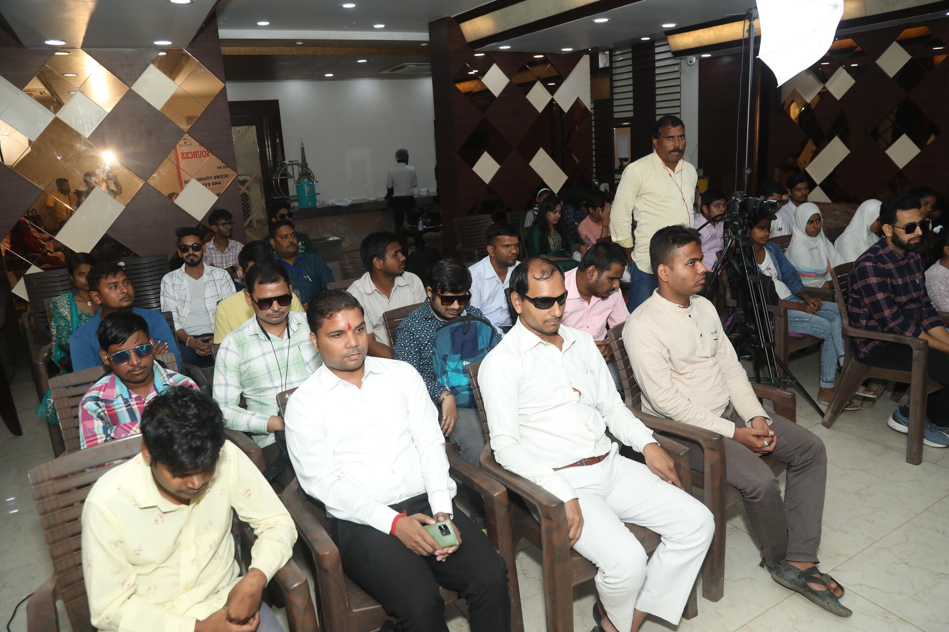 A sensitization session held at Lucknow Gymkhana, Lucknow, in 2024 with participants engaging in discussion.